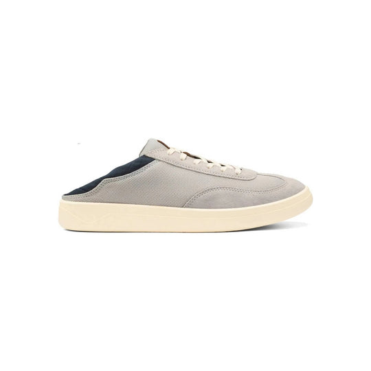 Gray low-top sneaker with white laces, suede overlays, and an off-white sole