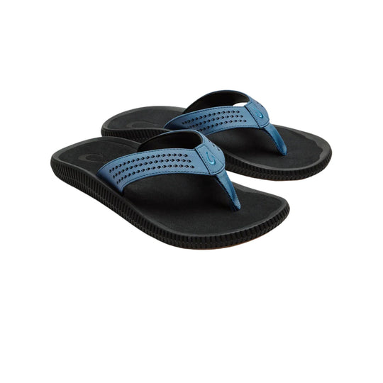 Pair of black flip flops with blue straps on a white background
