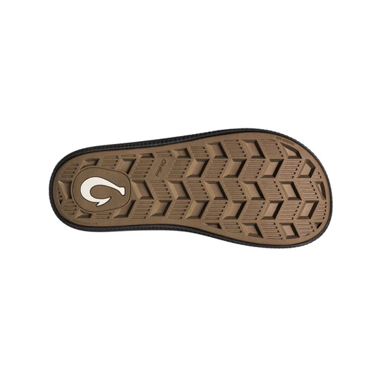 Brown sandal outsole with black tread and embossed logo