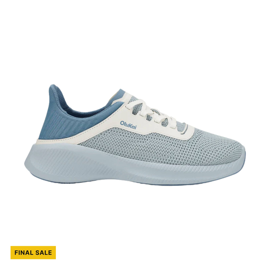Light blue knit sneaker with white overlays, white laces, and a thick molded sole