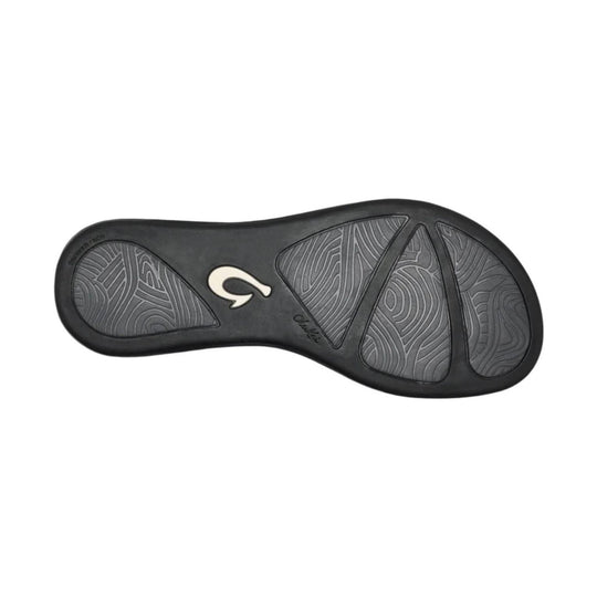 Black sandal outsole with gray tread patterns and a central logo