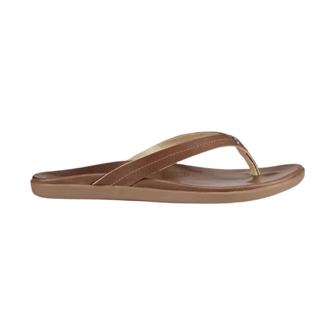 Brown leather thong sandal with a tan sole, side view