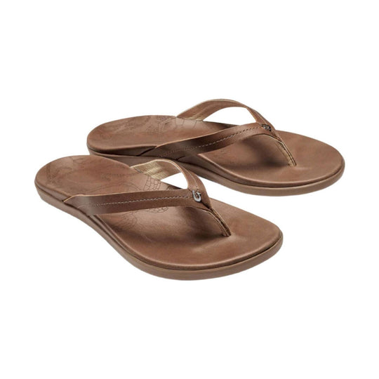 Pair of brown leather thong sandals with cushioned soles