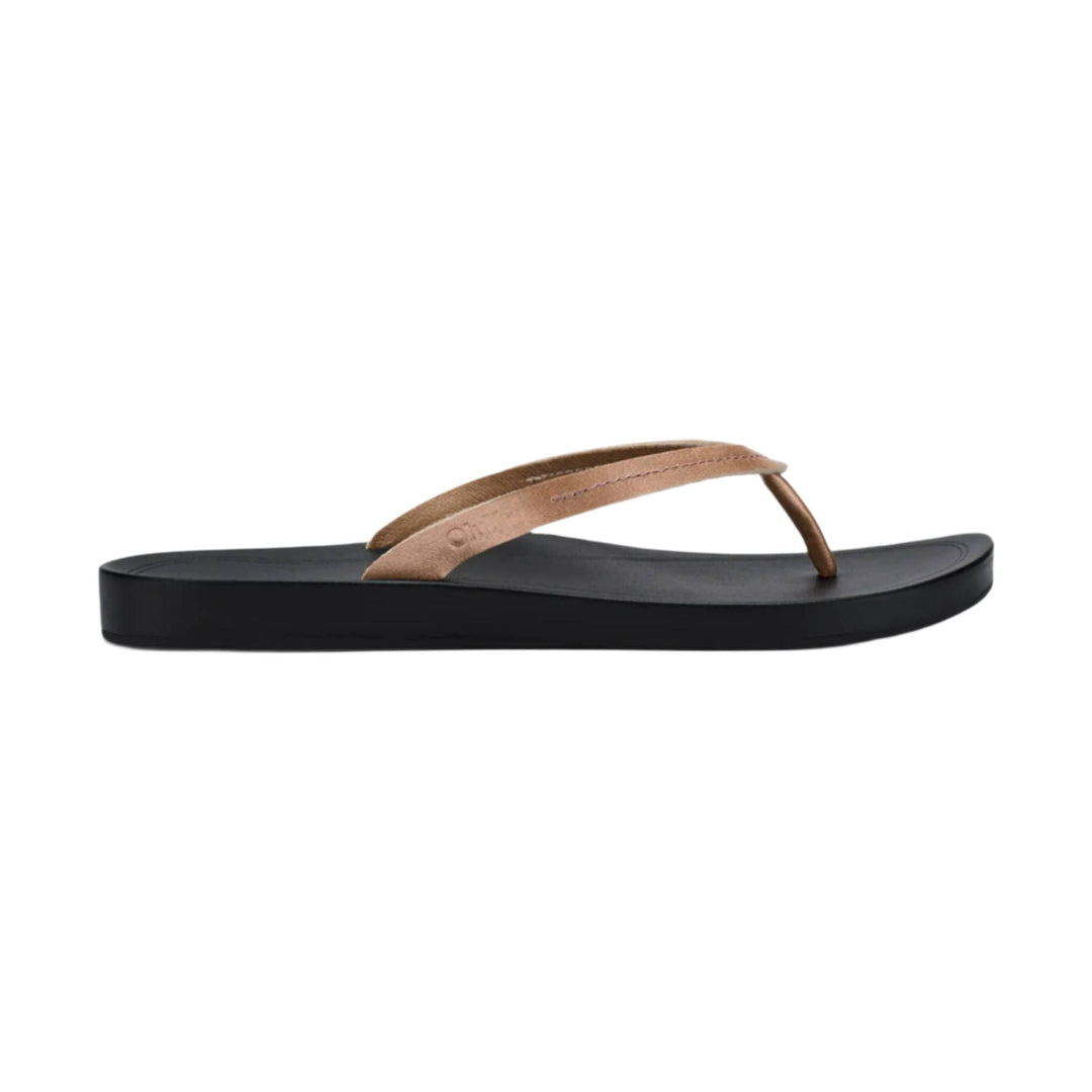 Brown thong sandal with a black platform sole