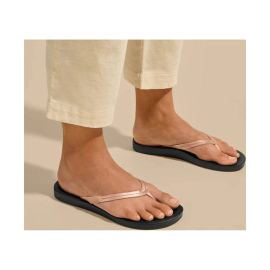Beige leather thong sandals with black soles