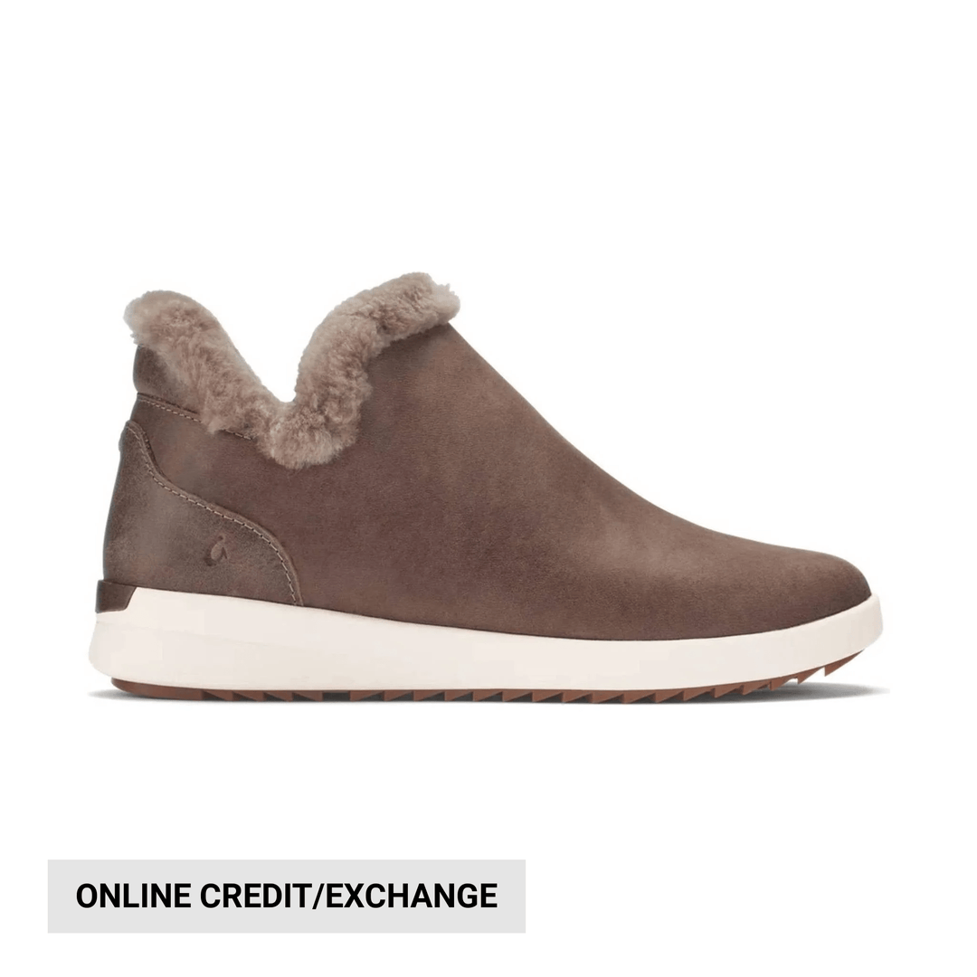 Brown suede ankle boot with fleece trim and off-white sole, side view