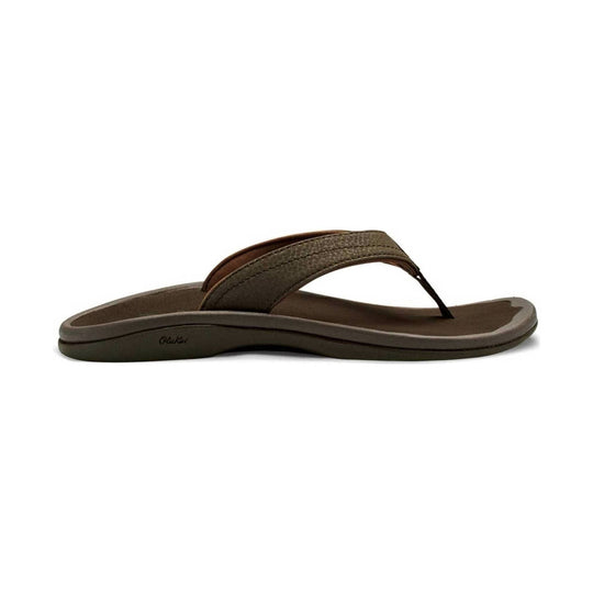 Brown thong sandal in side view with textured strap and thick cushioned sole