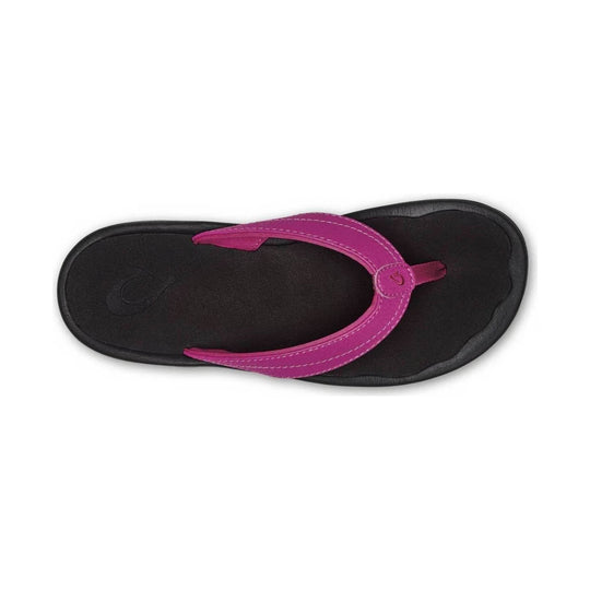 Black flip-flop sandal with a bright pink strap