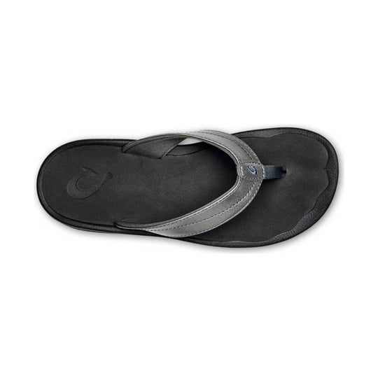 Black and gray thong sandal with a cushioned footbed and woven strap