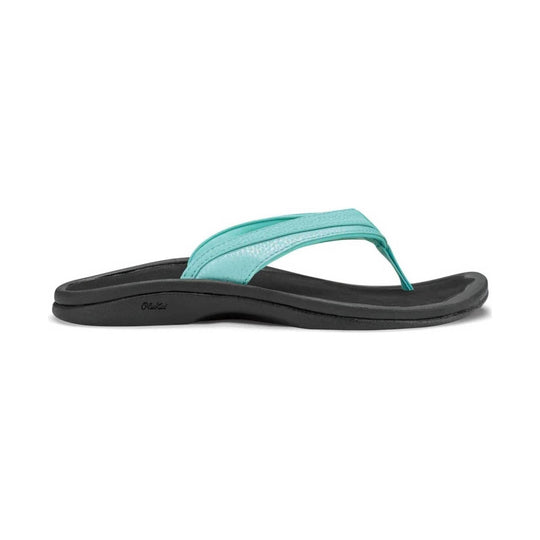 Teal thong sandal with a black contoured sole and textured strap
