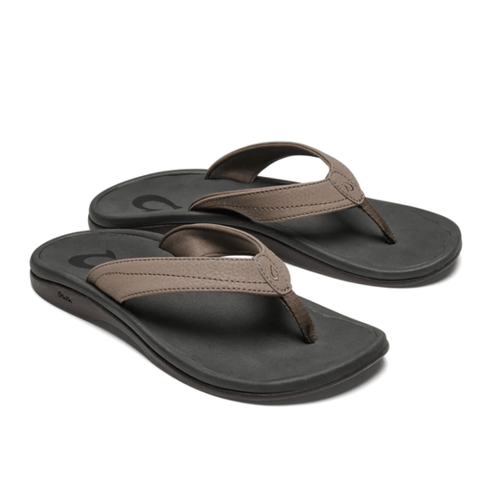 Pair of brown thong sandals with black footbeds and padded straps