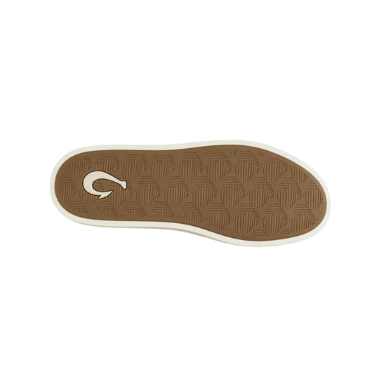 Tan rubber shoe outsole with white edge and patterned tread