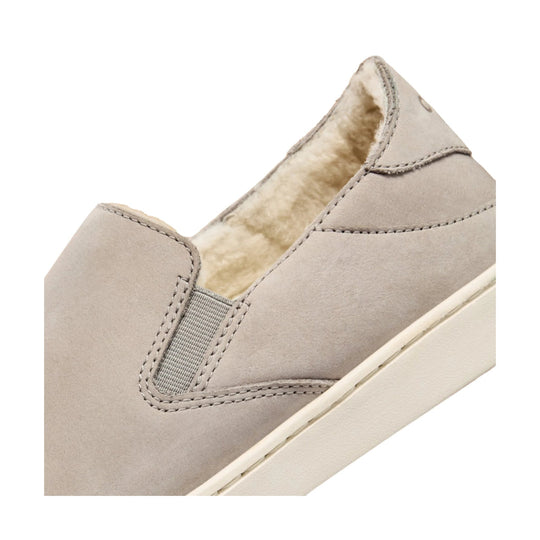 Taupe slip-on shoe with fuzzy lining and visible side elastic panel