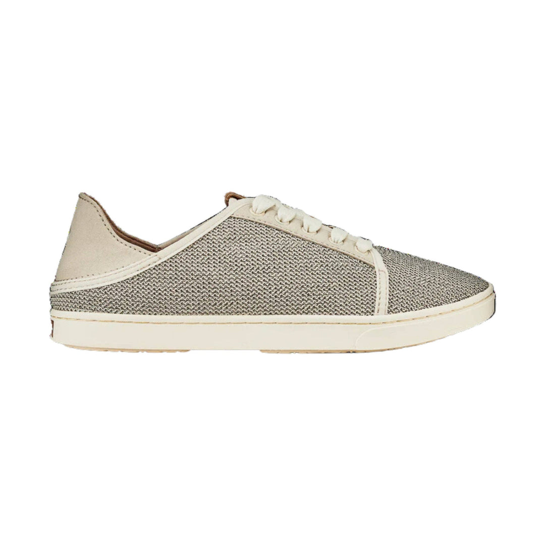 Beige slip-on sneaker with textured knit upper, cream laces, and white sole