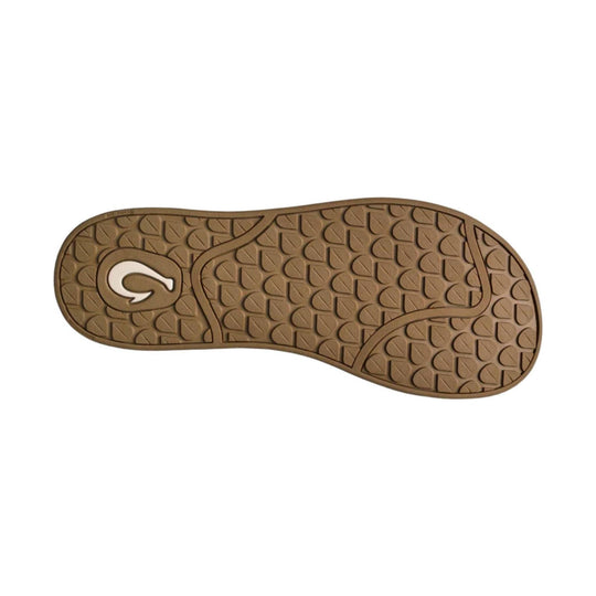 Brown sandal outsole with a textured tread pattern and embossed logo detail