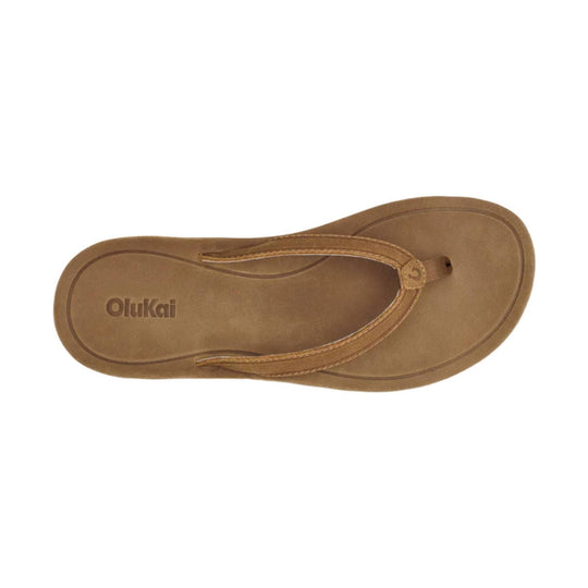 Tan thong sandal with Olukai logo on the footbed