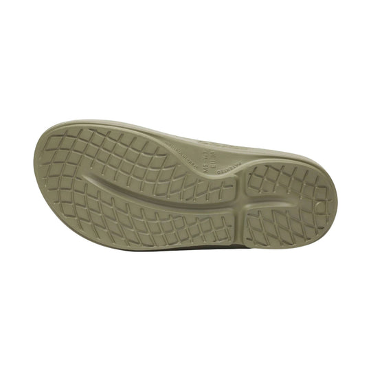 Olive slip-on sandal sole with textured tread and size markings