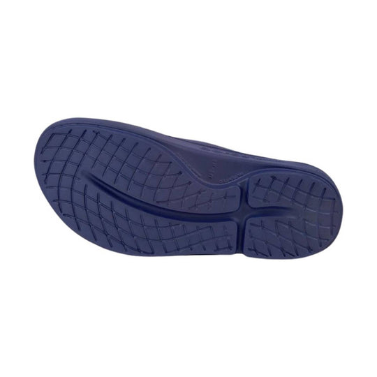 Navy blue shoe sole on a white background