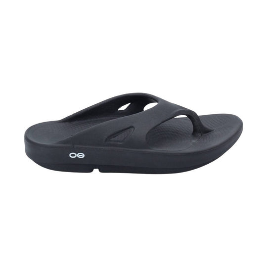 Black thong flip flop with OOfos logo on white background