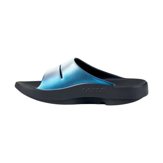 Blue and black slide sandal with a thick contoured sole