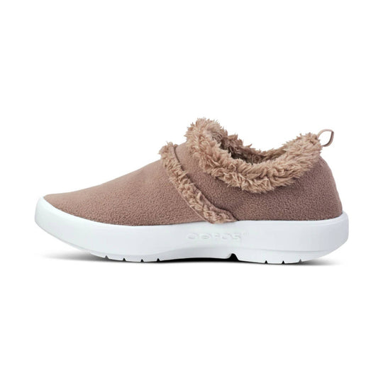 Tan sherpa-lined slip-on shoe with white platform sole