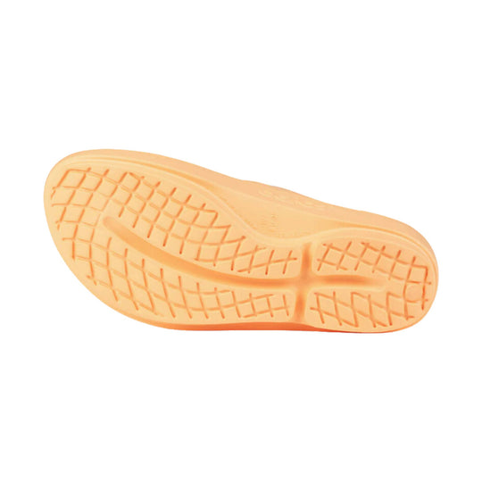 Orange rubber sandal sole with square tread pattern