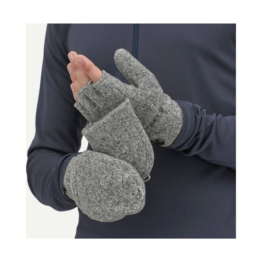 Gray knit fleece mittens with fold-over fingerless flap and thumb cover, worn over a navy jacket