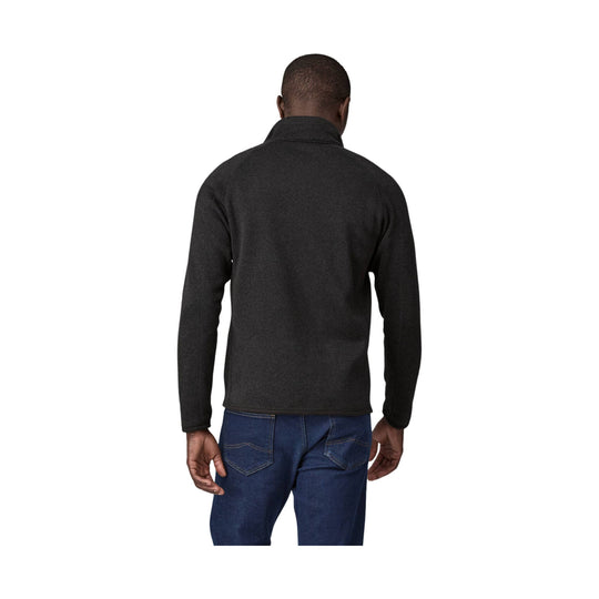 Dark fleece jacket shown from the back with a stand collar and long sleeves
