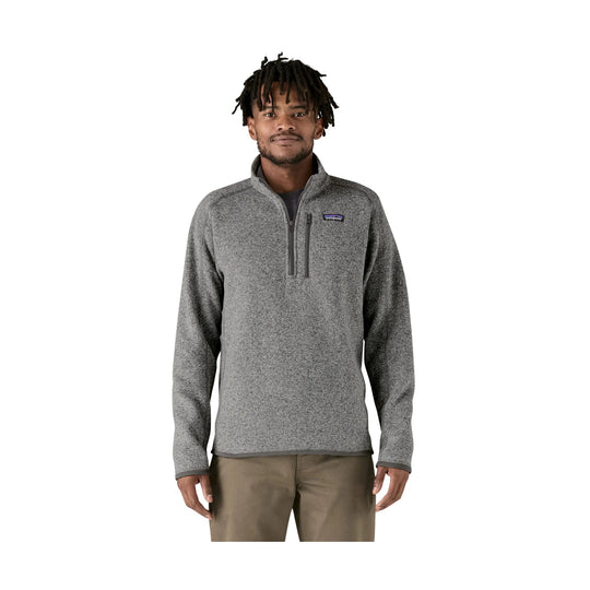 Heather gray quarter-zip fleece pullover with a chest zip pocket and small logo patch
