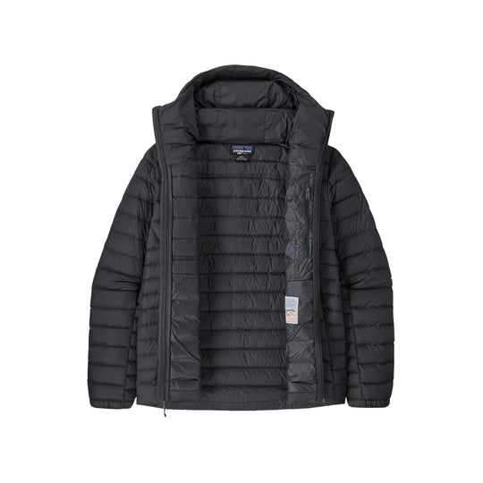 Black hooded puffer jacket with front zipper and chest logo patch