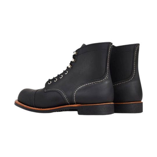 Black leather lace-up ankle boots with contrast stitching and brown welt
