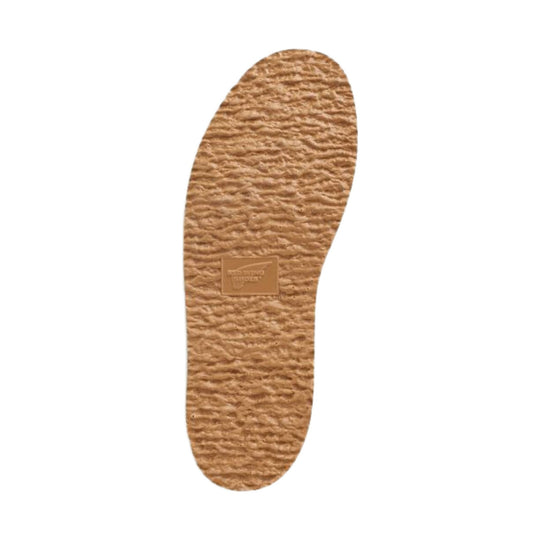 Tan textured boot outsole with a Red Wing Shoes logo stamp