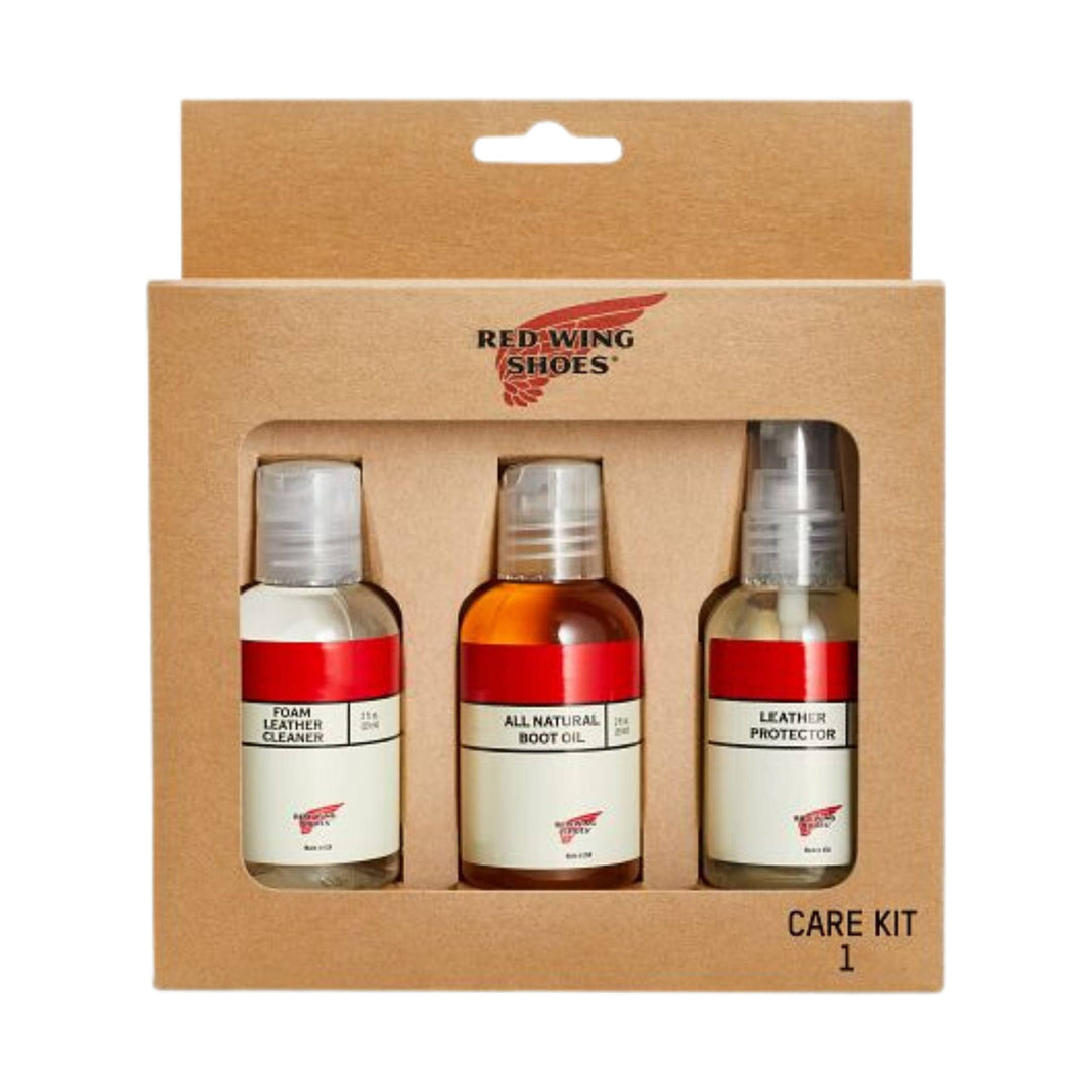 Leather care kit in a kraft cardboard box with three bottles and a clear front window