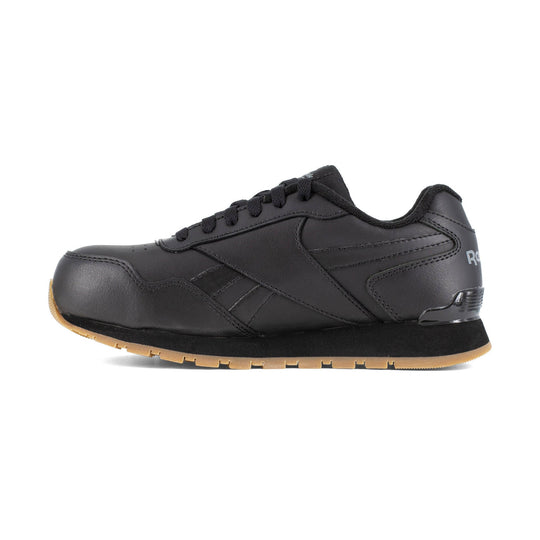 Black low-top athletic work shoe with lace-up closure and gum outsole