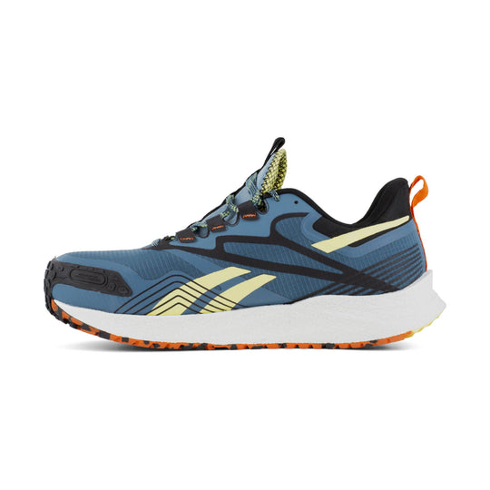 Blue low-top trail shoe with black overlays, yellow accents, and a thick white foam sole