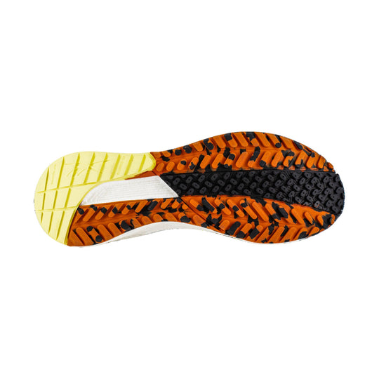Trail shoe outsole with orange, black, and yellow tread