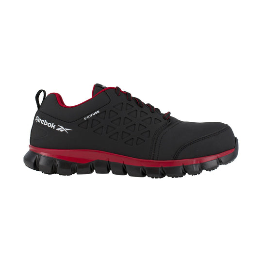 Black low-top work shoe with red trim, branded side logo, and thick treaded sole