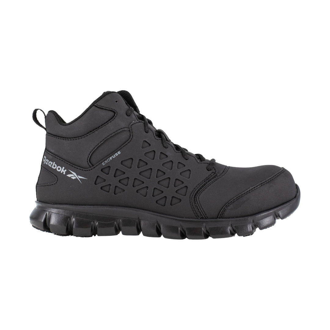Black mid-cut work shoe with triangular side cutouts, laces, and a chunky treaded sole