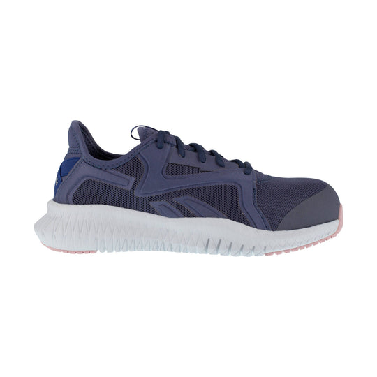 Navy athletic work shoe with a white textured sole and pink accents, shown in side view