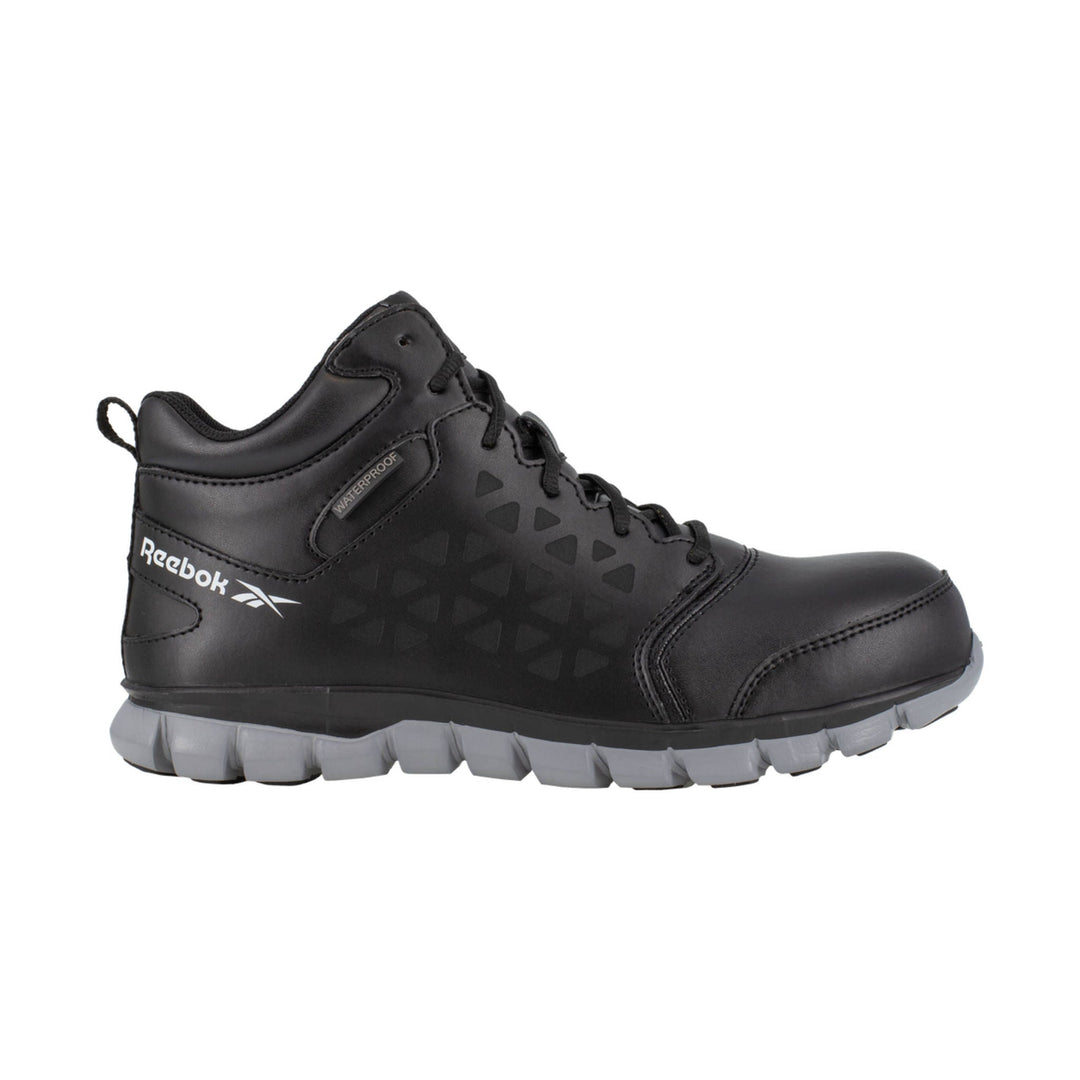 Black high-top work shoe with gray lug sole and visible Reebok and Waterproof markings