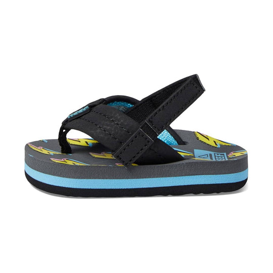 Black kids' flip-flop sandal with crossed straps, blue footbed stripe, and colorful patterned insole