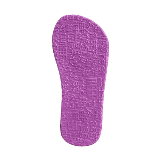 Purple flip-flop footbed with embossed REEF pattern and padded texture