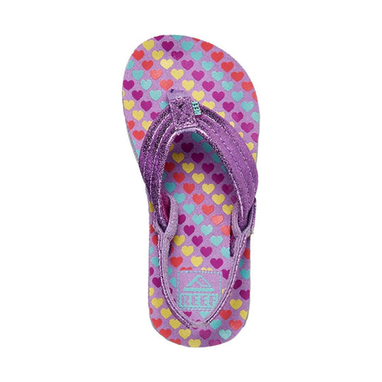 Purple heart-print flip flop with glittery straps and REEF logo on the footbed