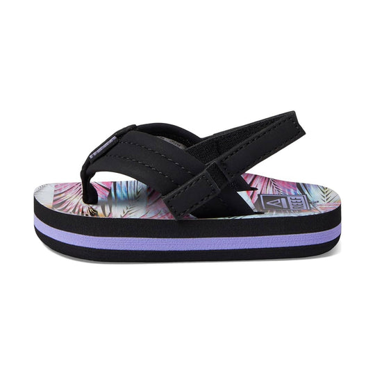 Black kids' platform flip-flop with palm-print footbed and purple stripe on the sole