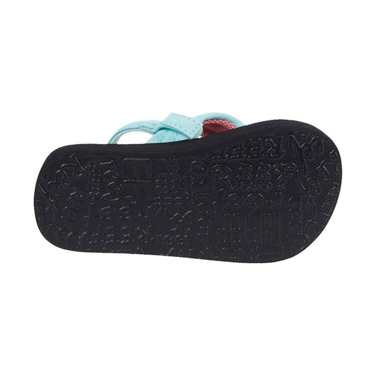 Black flip-flop sole with embossed floral and pattern details, viewed from below, with light blue straps visible at the top
