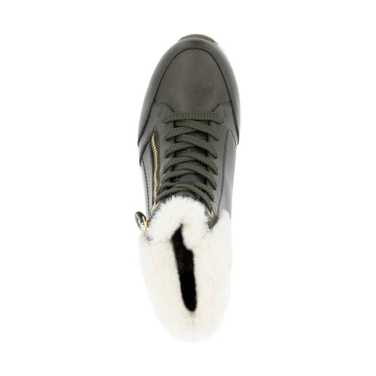 Dark lace-up sneaker boot with white faux-fur trim and side zipper, top view