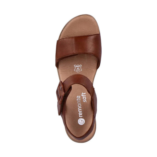 Brown leather sandal with wide toe strap, ankle strap, and open heel, viewed from above