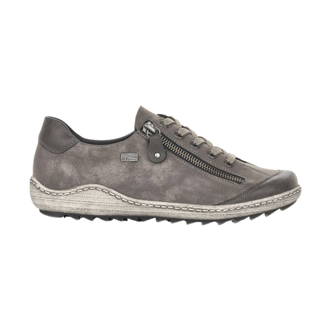 Gray low-top casual lace-up shoe with side zipper, stitched sole, and black tread