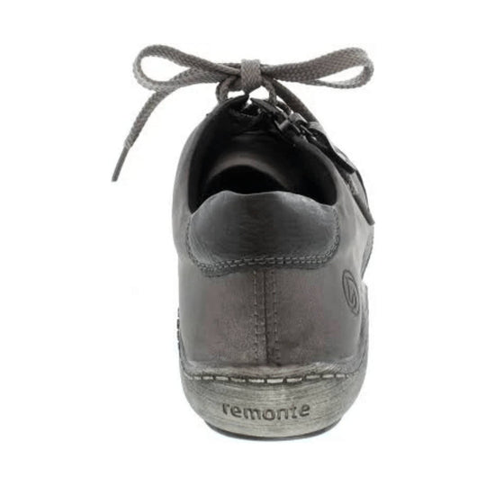 Gray low-top casual shoe with gray laces and a textured sole