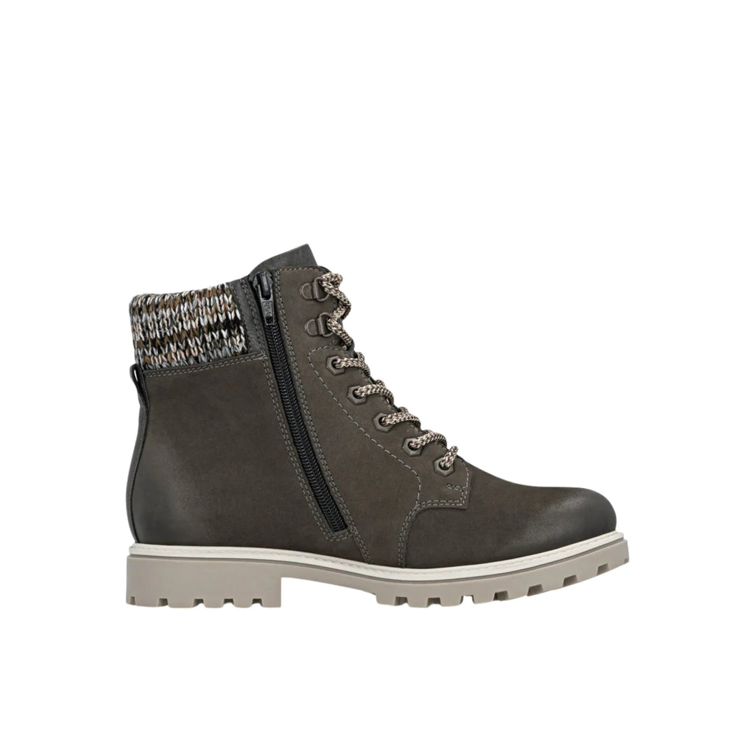 Dark brown ankle boot with side zipper, lace-up front, and chunky lug sole